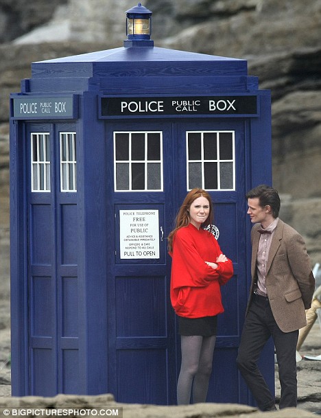 Matt Smith as the Eleventh Doctor and Karen Gillan as Amy Pond outside the new TARDIS