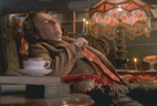 Sylvester McCoy relaxing in TARDIS